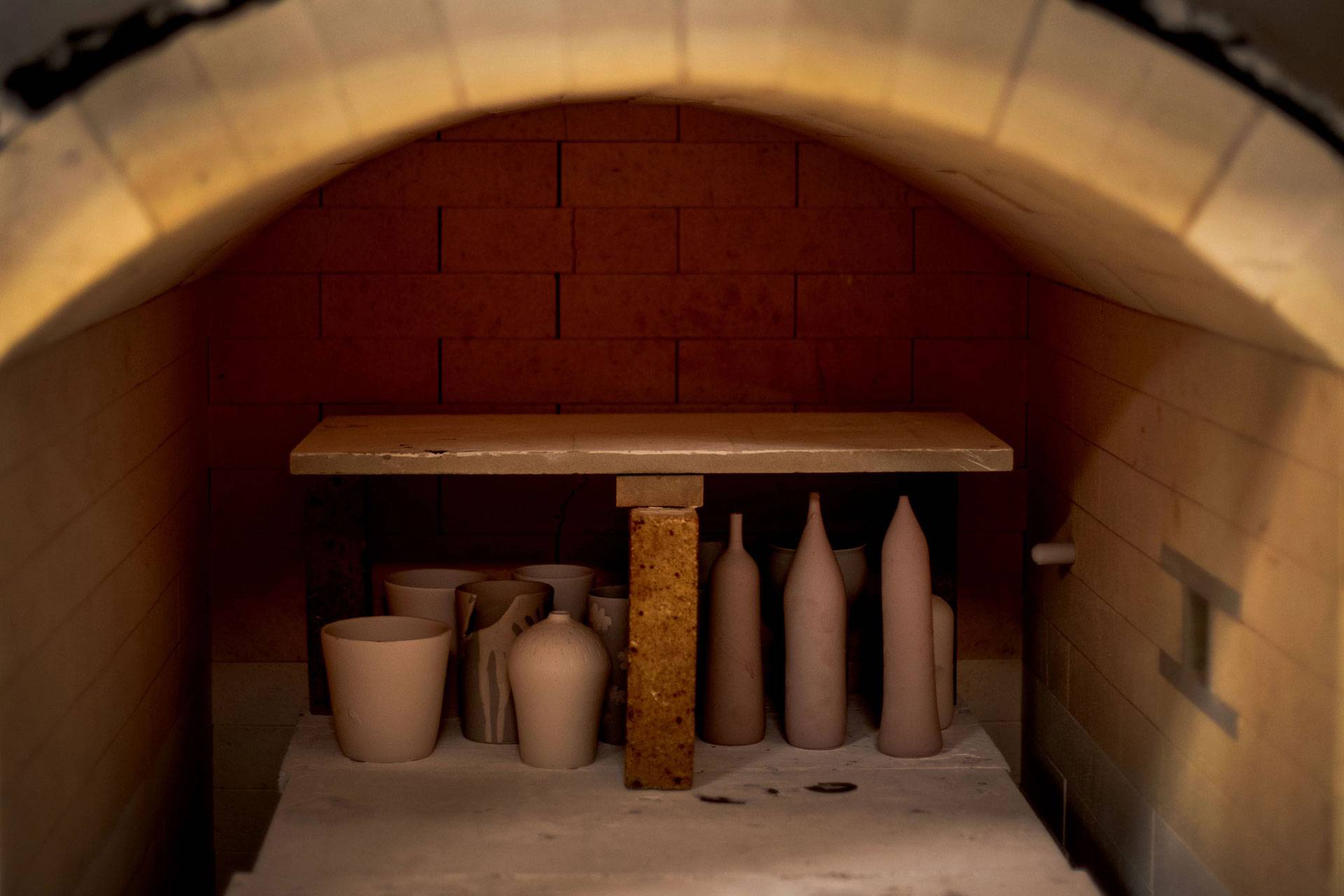 Ceramic works inside the kiln